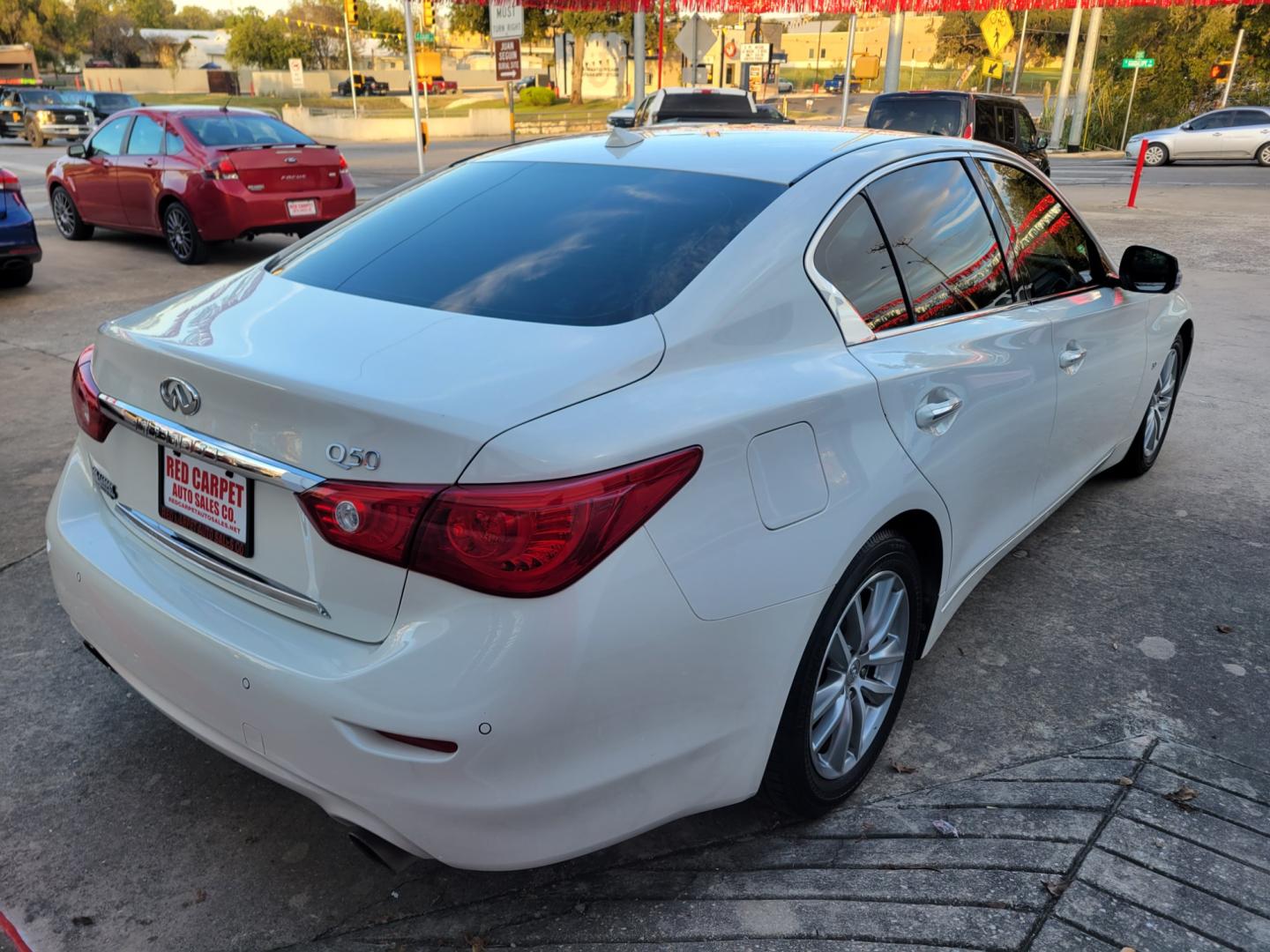 2015 Infiniti Q50 Premium (JN1BV7AP3FM) with an 3.7L V6 DOHC 24V HYBRID engine, 7-Speed Automatic transmission, located at 503 West Court, Seguin, TX, 78155, (830) 379-3373, 29.568621, -97.969803 - 2015 Infiniti Q50 Premium with a 3.7L V6 DOHC 24V HYBRID, Automatic, Tilt, Cruise, AM/FM/CD Touchscreen Stereo, Power Windows, Locks, Seat and Side Mirrors, Bluetooth, Leather Seats, Navigation System, Heated Seats, Dual Climate Control, Rear A/C, Power Sunroof, Universal Garage Openers, Alloy Wheel - Photo#2